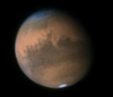 Marte visto a trav�s de un telescopio de 10 pulgadas, el 18 de septiembre de 2005. El norte esta hacia arriba. 
<i>Cr�dito: <a href= mailto:alan@greatarrow.com>Alan Friedman</a> de Buffalo, Nueva York.</i>
